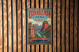 A vintage metal sign for Danxian Park, China, featuring a scenic mountain landscape with a river and lush greenery.