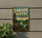 A vintage metal sign for Dawson Forest in Georgia, featuring a scenic landscape with pine trees, a river, and mountains.