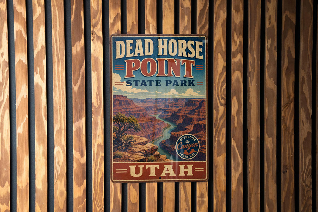 A vintage metal sign for Dead Horse Point State Park in Utah, featuring a scenic image of the Grand Canyon.