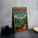 A vintage-style metal sign advertising the Dong Van Karst Plateau Park in Vietnam, featuring a scenic mountain landscape.