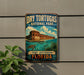 A vintage-style sign for Dry Tortugas National Park, featuring an illustration of Fort Jefferson in Florida.