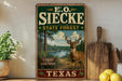 A vintage-style metal sign for E.O. Siecke State Forest in Texas, featuring a deer in a forest landscape.