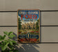 A vintage-style sign for Edsel & Eleanor Ford House, featuring a large illustration of the house and the Ford logo.