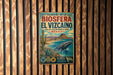 A vintage metal sign with a whale and desert landscape, mounted on a wooden wall.