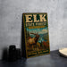 A vintage-style metal sign for the Elk State Forest in Pennsylvania, featuring an illustration of a large elk in a forest setting.