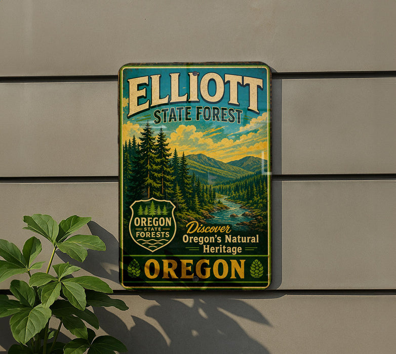 A metal sign for Elliott State Forest, featuring a scenic illustration of a forest landscape with mountains in the background.