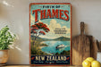 a vintage-style poster advertising the First of Thames, a ferry service to the Coromandel Peninsula in New Zealand.