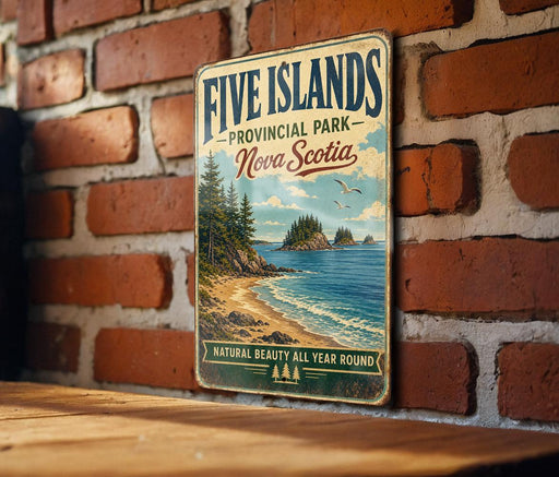 a vintage-style metal sign for Five Islands Provincial Park in Nova Scotia, Canada, mounted on a brick wall.