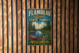 A vintage-style metal sign for the Flambeau River State Forest in Wisconsin, featuring a scenic illustration of a canoe on the river and a forest landscape.