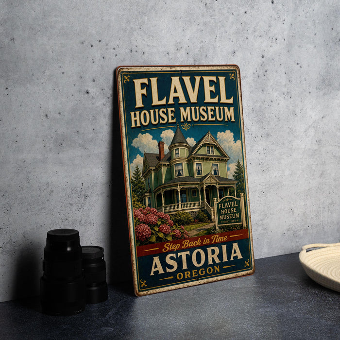 A vintage-style metal sign for the Fl aval House Museum in Astoria, Oregon, featuring an illustration of a Victorian-style house with a prominent chimney.