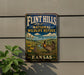 A vintage-style sign for the Flint Hills National Wildlife Refuge in Kansas, featuring a bird and a scenic landscape.