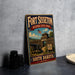 A vintage-style metal sign for Fortisset Historic State Park in South Dakota, featuring an illustration of a cannon and a wooden fort.