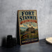 A vintage-style sign for Fort Stanwix, a National Monument in New York, with a castle and cannon in the background.
