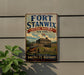 a vintage-style sign for Fort Stanwix, a National Monument in New York, with a picture of the fort and surrounding landscape.