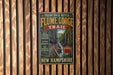 A vintage trail sign for the Franconia Notch Flume Gorge Trail, located in New Hampshire.