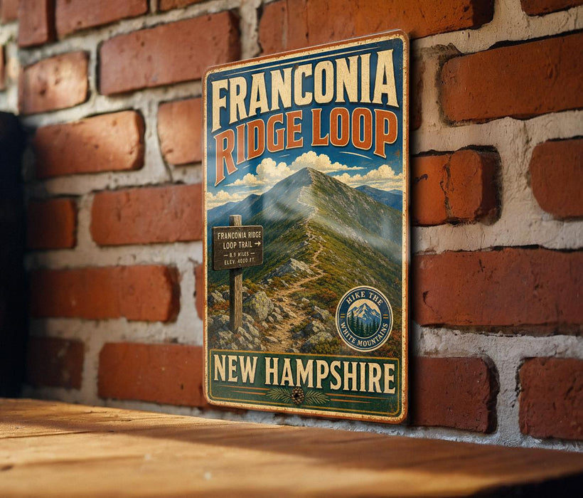 A vintage-style metal sign for the Franconia Ridge Loop in New Hampshire, featuring a mountain landscape and trail information.
