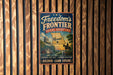 A vintage-style metal sign with the text "Freedom's Frontier National Heritage Area" and a map of Missouri, mounted on a wooden wall.