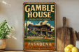 A vintage-style sign for the Gamble House, a historic landmark in Pasadena, California.