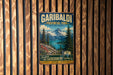 A vintage-style metal sign for Garibaldi Provincial Park in British Columbia, Canada, featuring a scenic mountain landscape with pine trees and a lake.