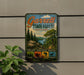 A vintage metal sign for Garrett State Forest in Maryland, featuring a scenic landscape with pine trees, a lake, and mountains.