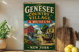 A vintage-style metal sign for the Geneseo Country Village & Museum in New York, featuring an illustration of a red brick building, a horse-drawn carriage, and a mill.
