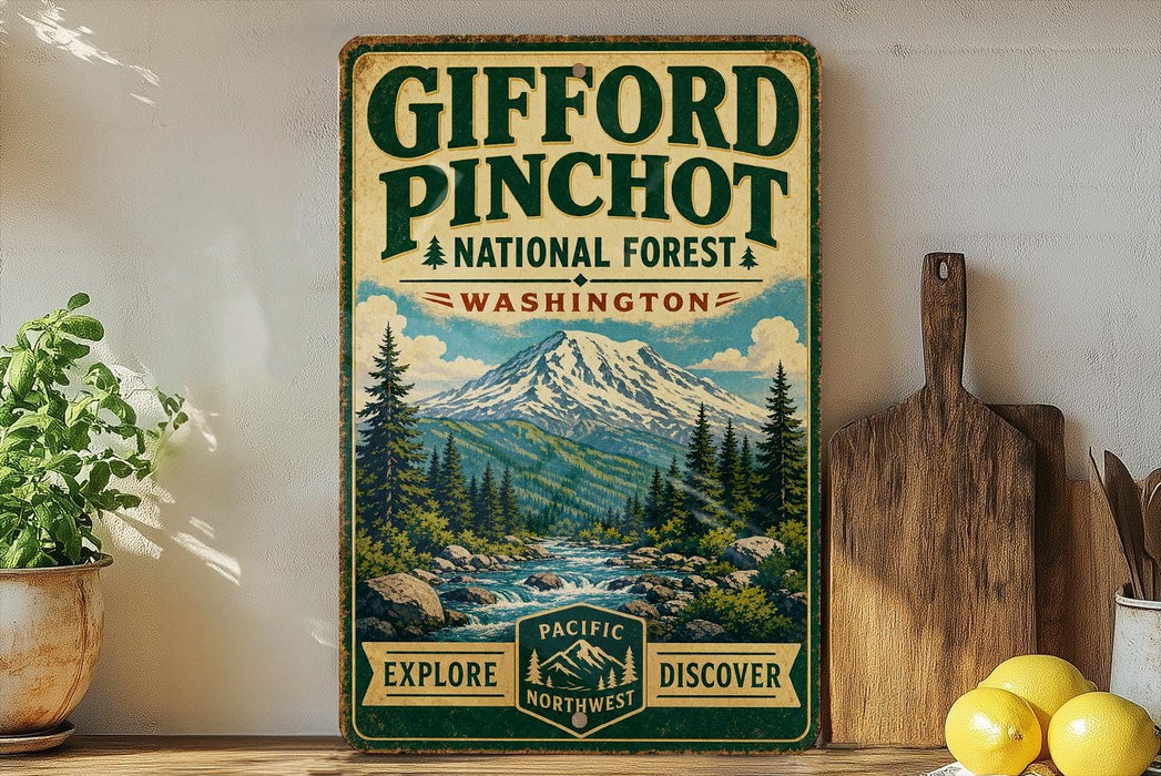 a vintage-style sign for Gifford Pinchot National Forest in Washington, with a mountain landscape and a river in the background. The sign also includes the words "Explore" and "Discover" at the bottom.