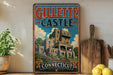 A vintage-style sign for Gillette Castle in Connecticut, featuring an illustration of the castle and the text "GILLETTE CASTLE CONNECTICUT".