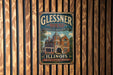A vintage metal sign for the Glissner House in Illinois, featuring an illustration of the historic building.