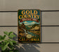 A vintage-style sign for the Gold Country Heritage Trail in California, featuring a scenic illustration of a gold pan and a waterfall.