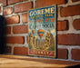 A vintage-style sign for the GÜREME National Park and the Rock Sites of Cappadocia, Turkey, featuring a hot air balloon and a castle-like structure.