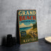 A vintage-style metal sign for Grand Beach Provincial Park in Manitoba, featuring a beach scene with a wooden walkway and a sign that says "Sandy Beach Clear Waters Natural Beauty".