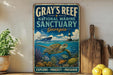 A vintage-style sign for Gray's Reef National Marine Sanctuary in Georgia, featuring a turtle swimming among colorful coral and fish.