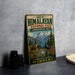 A vintage-style metal sign for the Great Himalayan National Park in the Himalayan region of India, featuring a mountain landscape and wildlife.