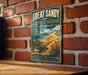 A vintage-style sign for the Great Sandy Biosphere Reserve in Australia, featuring a bird and a landscape with mountains and a body of water.