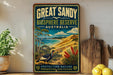 A vintage-style poster for the Great Sandy Biosphere Reserve in Australia, featuring a bird, a beach, and lush vegetation.