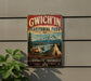 A vintage-style sign for GWICH'IN TERRITORIAL PARK, featuring a reindeer, a teepee, and a mountain landscape.