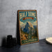 a vintage-style metal sign for the Half Dome Trail in Yosemite National Park, California.