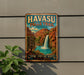 A vintage-style metal sign for Havasu Falls Trail in Arizona, featuring a waterfall and desert landscape.