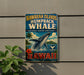 A vintage-style sign for the Hawaiian Islands humpback whale sanctuary, featuring a whale leaping out of the water and surrounded by tropical elements such as palm trees and flowers.