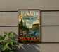 A vintage-style metal sign for the Hiawatha National Forest, featuring a scenic landscape with a lake, pine trees, and a bird.