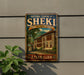 a vintage-style sign for the Historic Centre of Sheki, with a picture of a palace and the text "Azerbaijan" below it.
