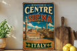 A vintage-style metal sign for the Historic Centre of Siena, Italy, featuring an illustration of the city's landmarks and architecture.