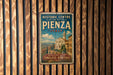 A vintage-style sign for the Historic Centre of Pienza, Italy, featuring an illustration of a historic building and the text "RENAISSANCE BEAUTY TIMELESS HERITAGE".