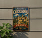 A vintage metal sign with a castle illustration and the text "Historic Fortified City of Carcassonne" is displayed on a wall.