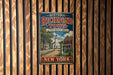 A vintage-style metal sign for Historic Richmond Town, featuring a scenic image of a small town with a church and a dirt road.