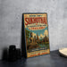 a vintage sign for the historic town of Sukhothai, Thailand, with a picture of Buddha and other historical buildings.