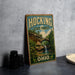 A vintage-style sign for Hocking State Forest in Ohio, featuring a scenic landscape with a waterfall and a bridge.
