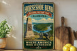 A vintage-style metal sign for Horseshoe Bend National Military Park in Alabama, featuring a cannon and a scenic landscape.