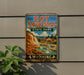 A vintage-style sign for Hot Springs State Park in Wyoming, featuring a scenic illustration of the park's natural beauty.