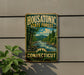 A vintage metal sign for Housatonic State Forest in Connecticut, featuring a scenic landscape with a river and pine trees.